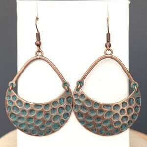 Textured antique brass earrings with patina coating